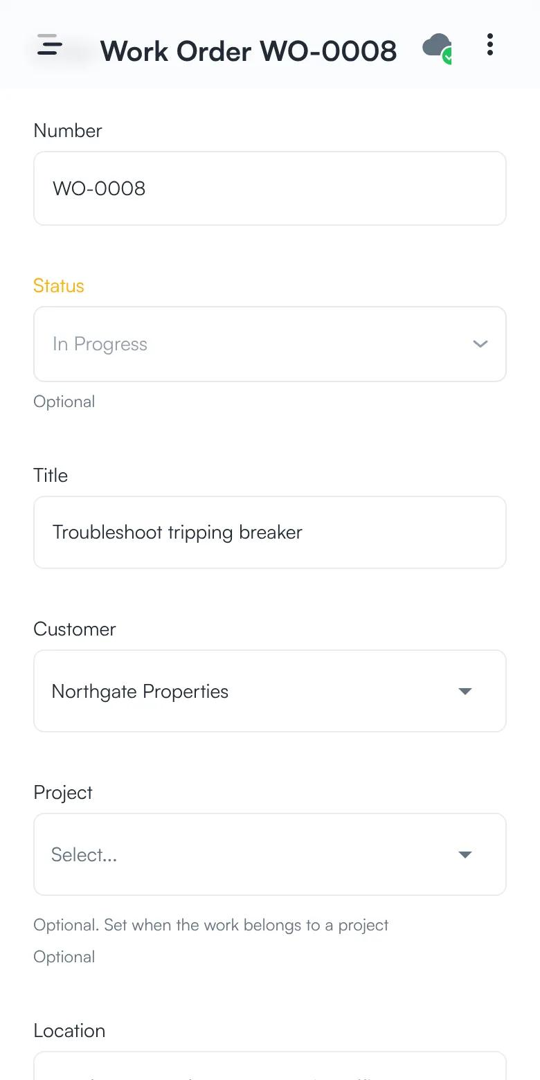 A work order in progress with its number, status, title, customer, project, and location.